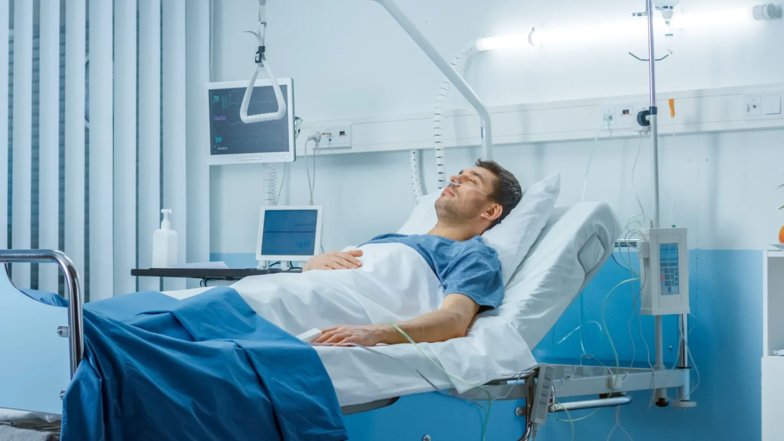 a person lying in a hospital bed