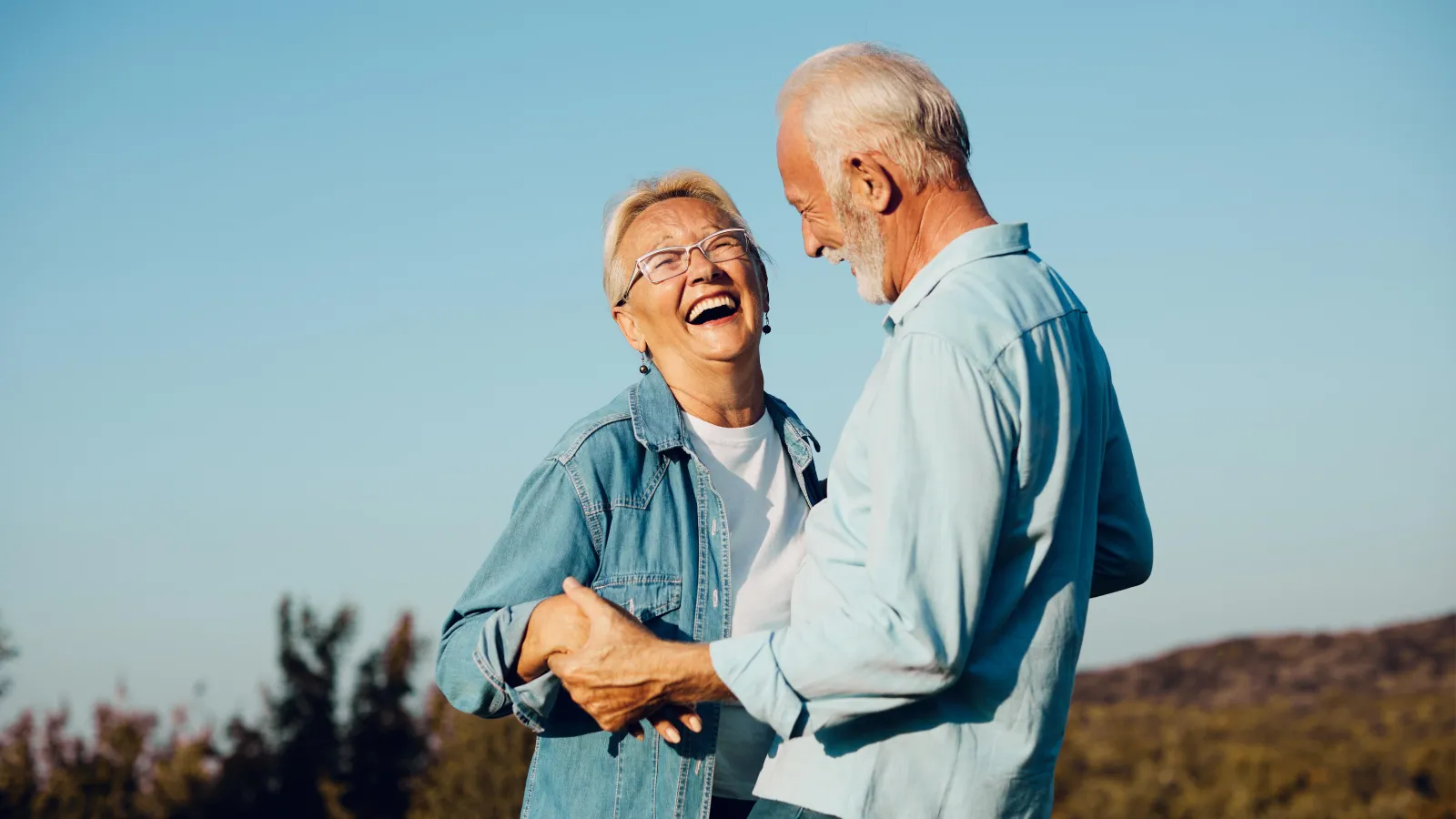 a man and woman embracing