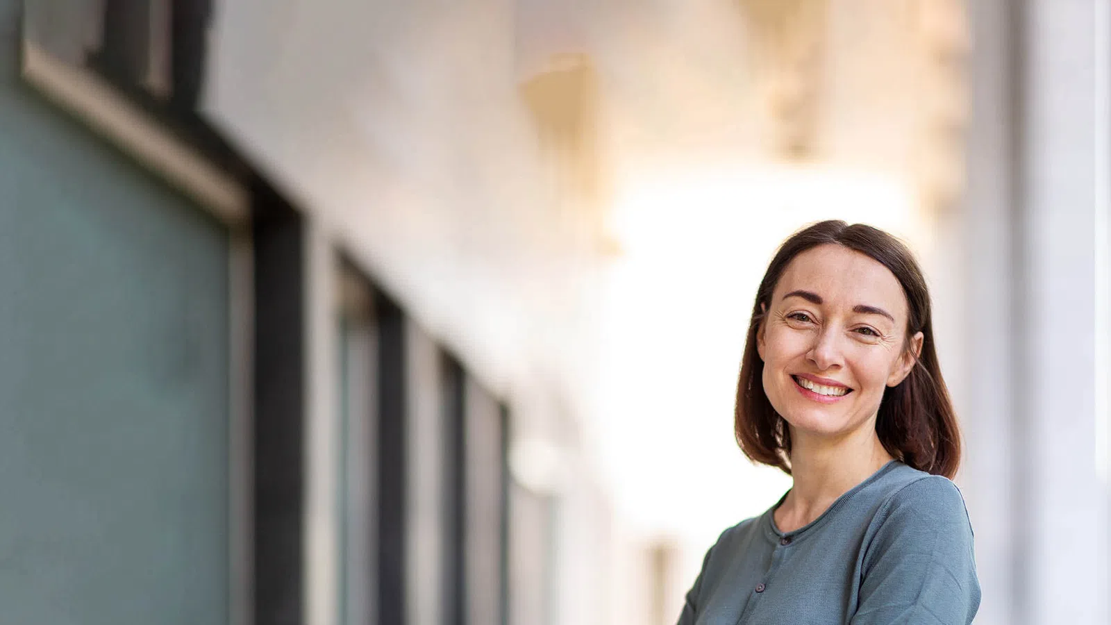 a woman smiling at the camera