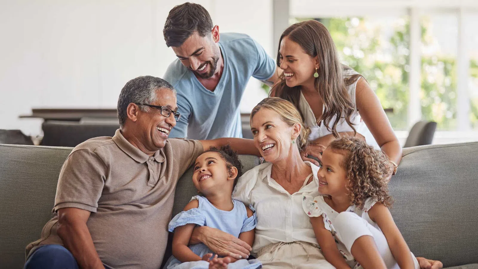 a family sitting on a couch