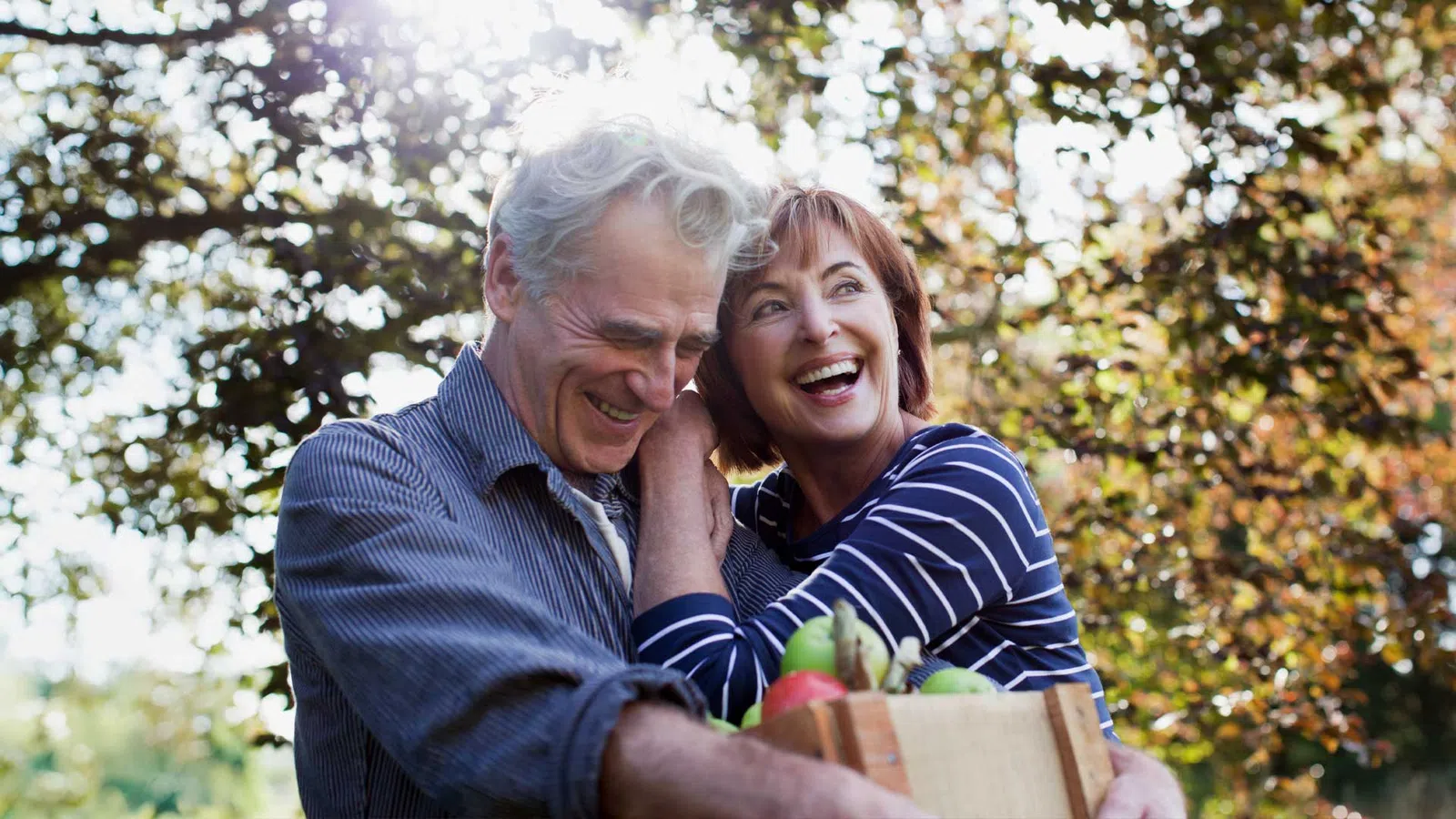 a man and a woman smiling