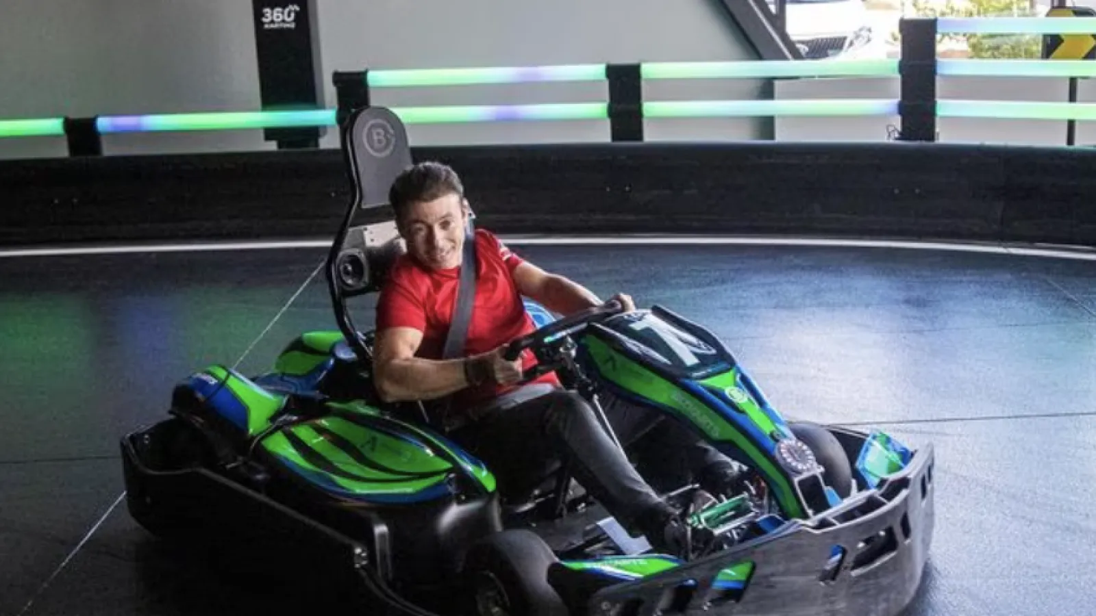 a person driving a go kart