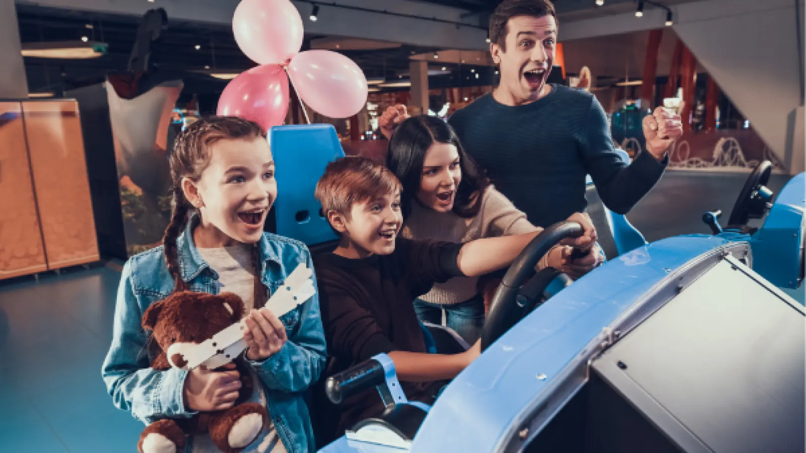a group of people in a go-kart ride experience