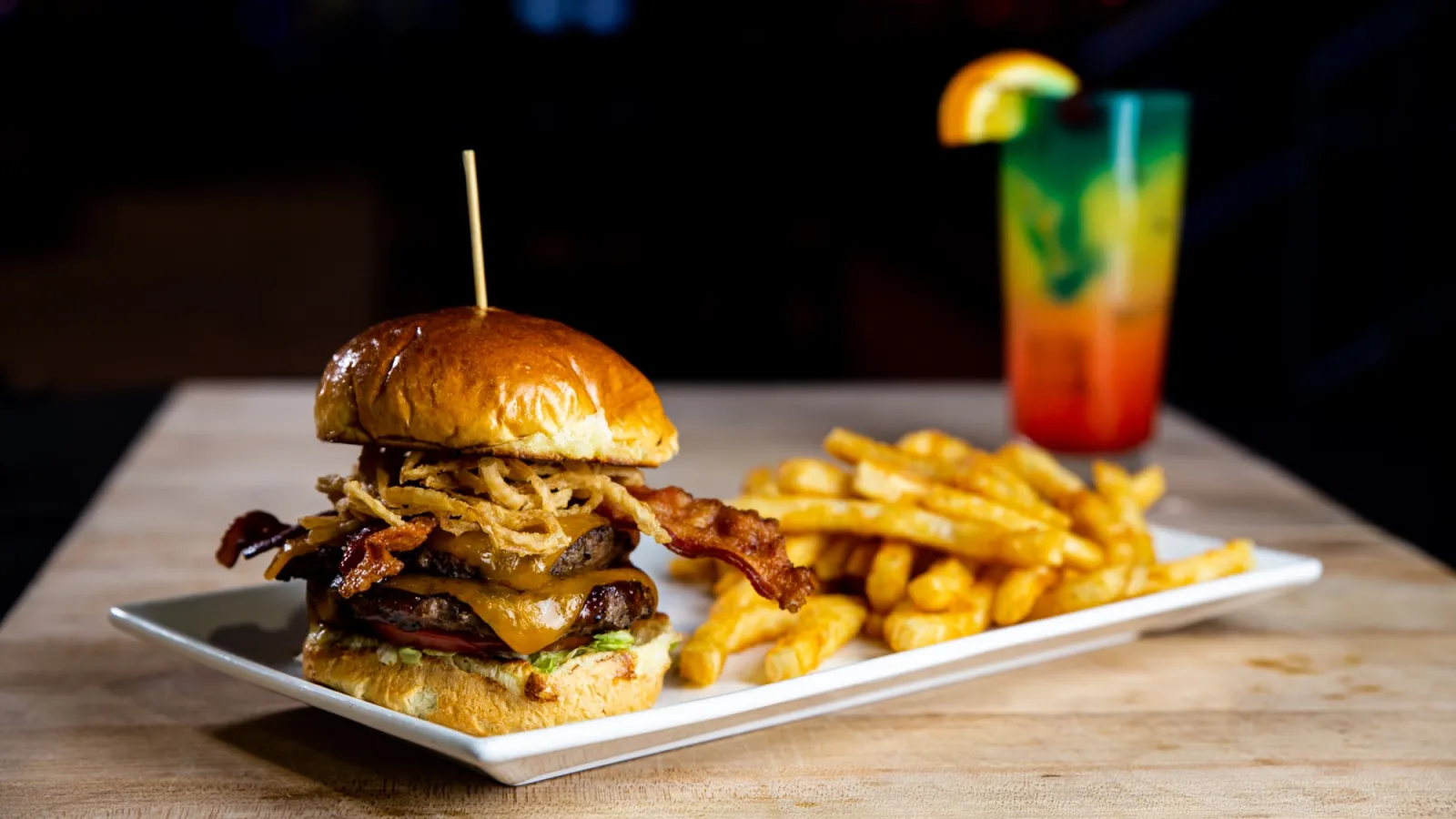 a sandwich sitting on top of a wooden table