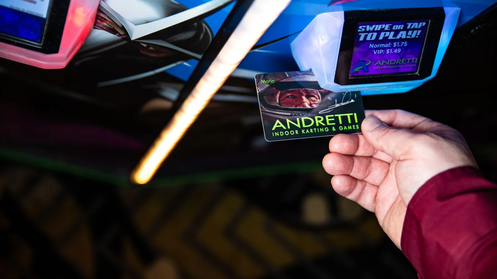 a person holding a game card