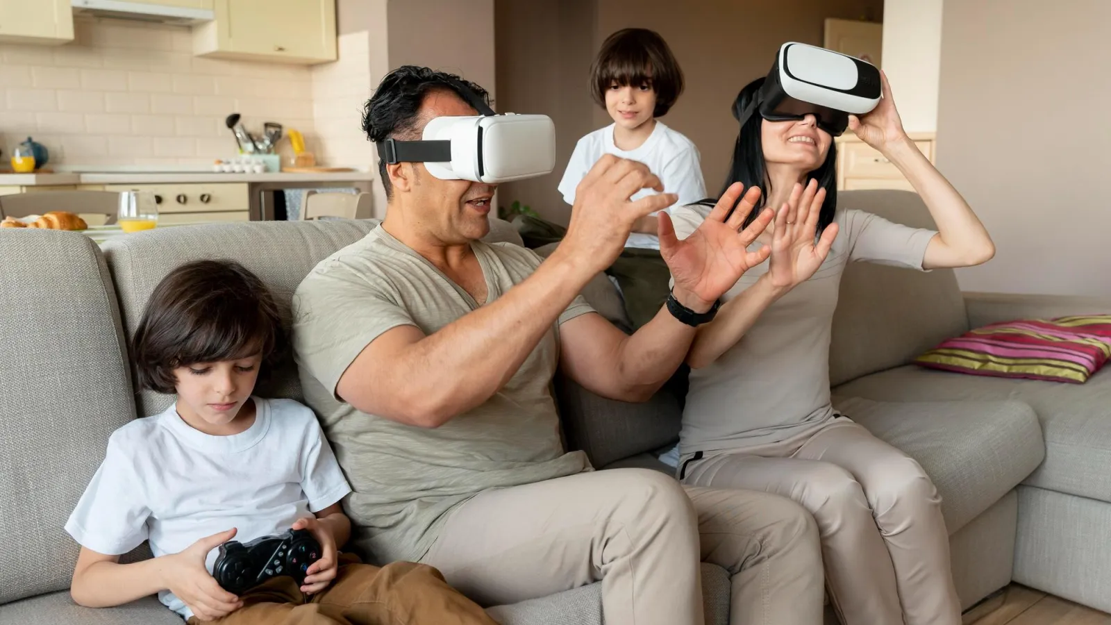 a group of people sitting on a couch wearing virtual reality goggles