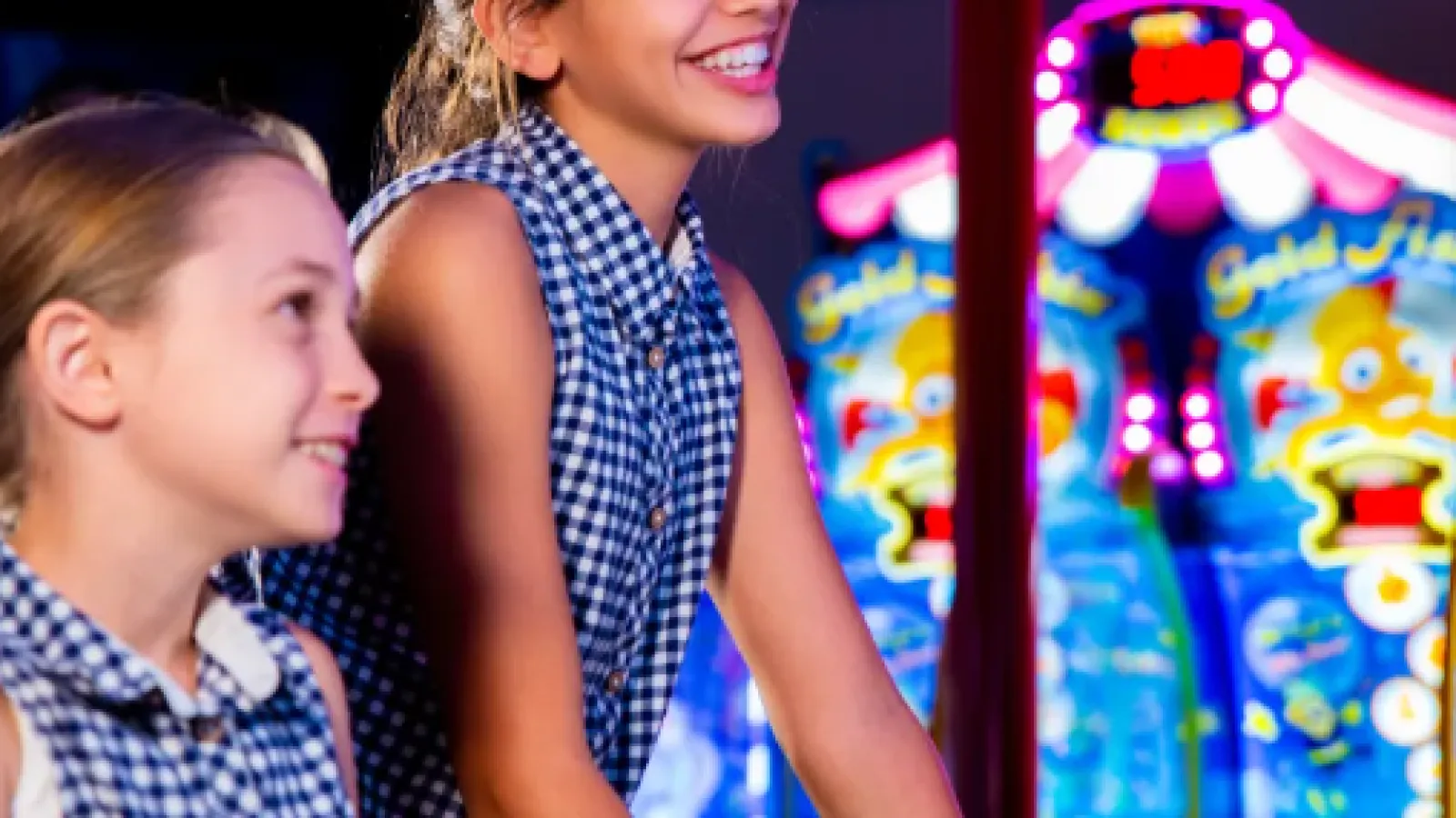 a person and a girl playing with a toy