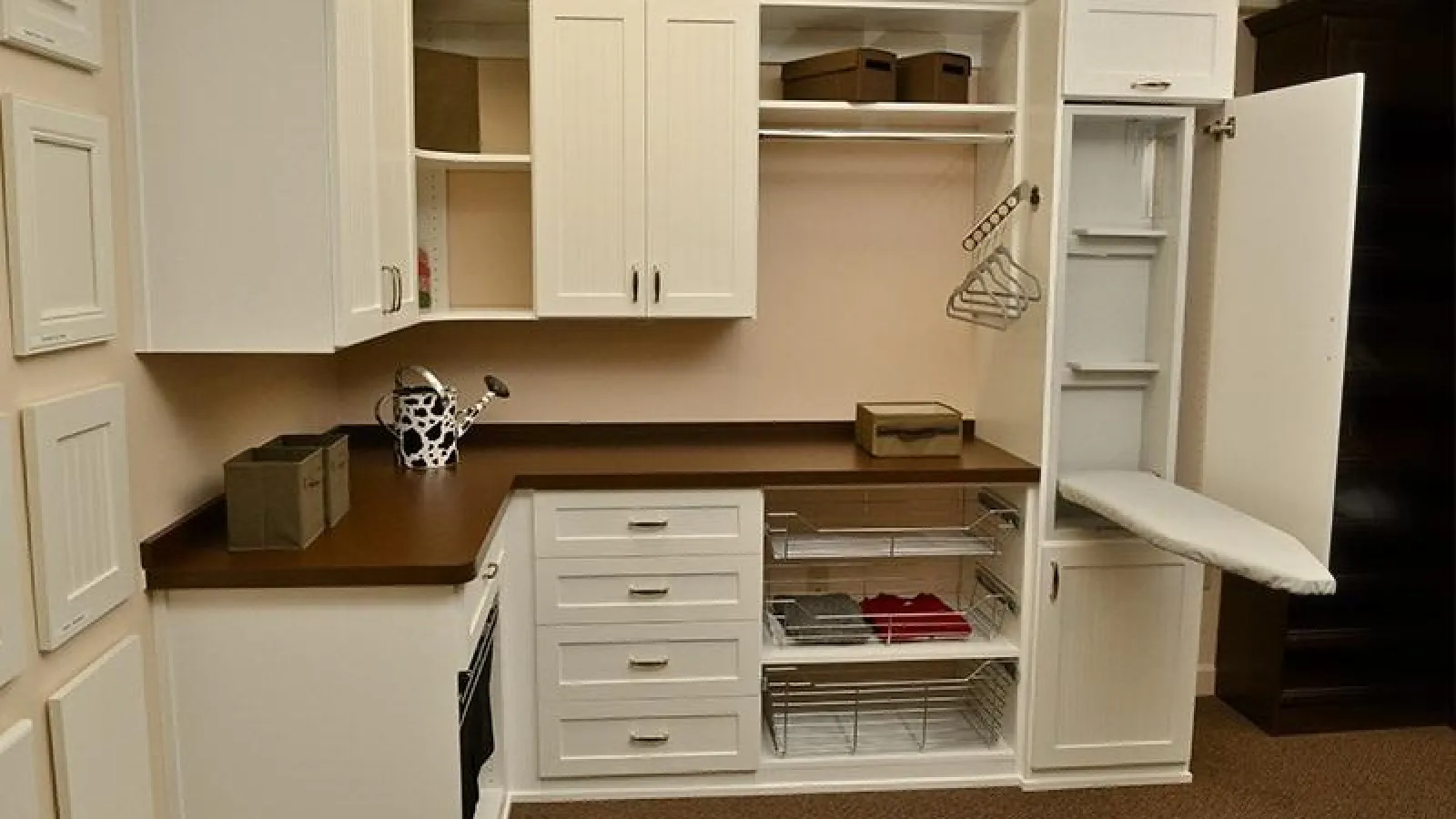 a kitchen with white cabinets