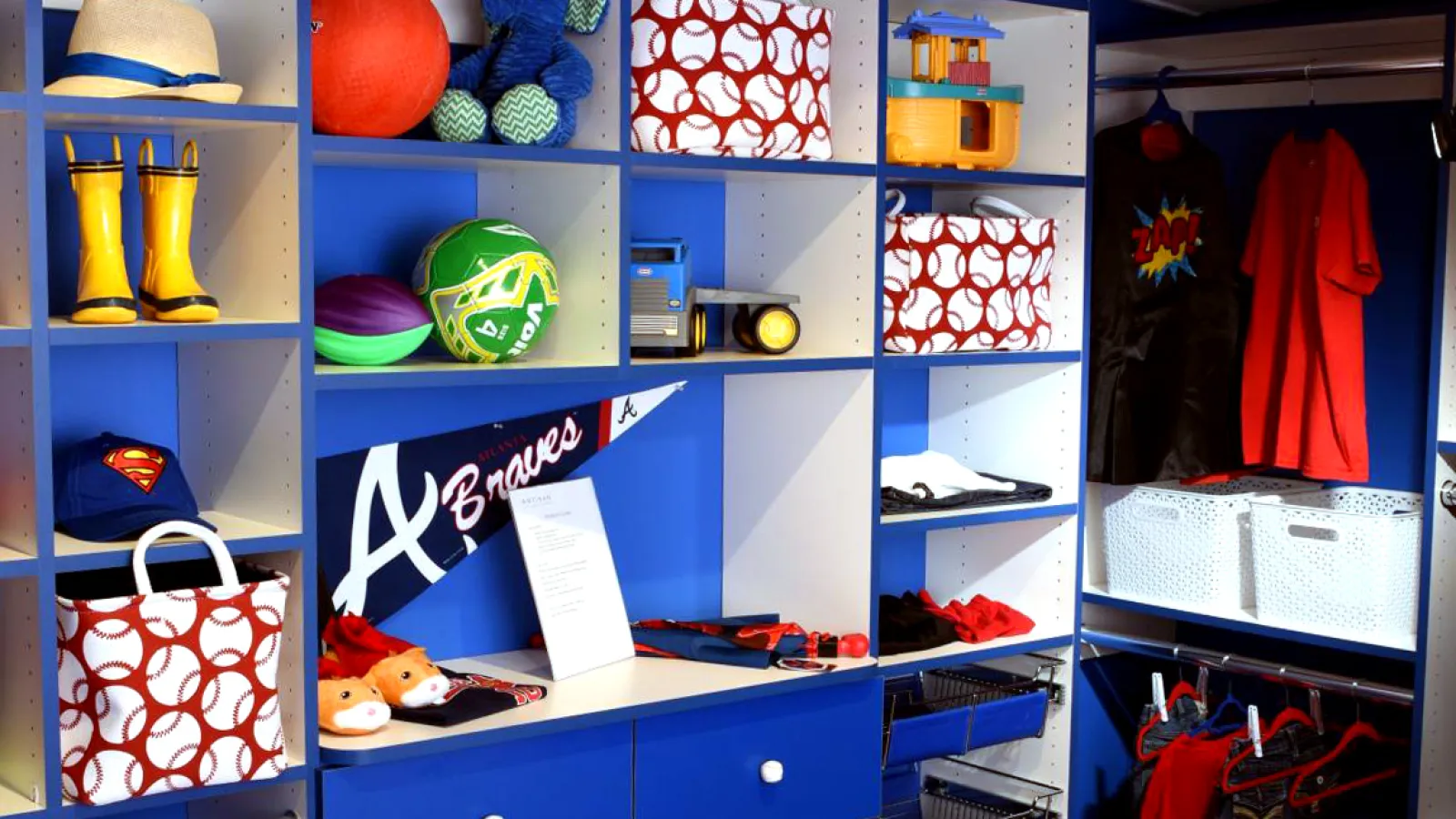 a blue shelving unit with a variety of objects on it