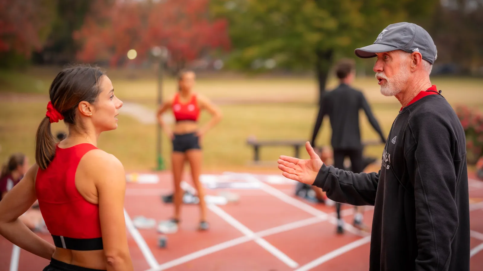 a man and a woman on a track