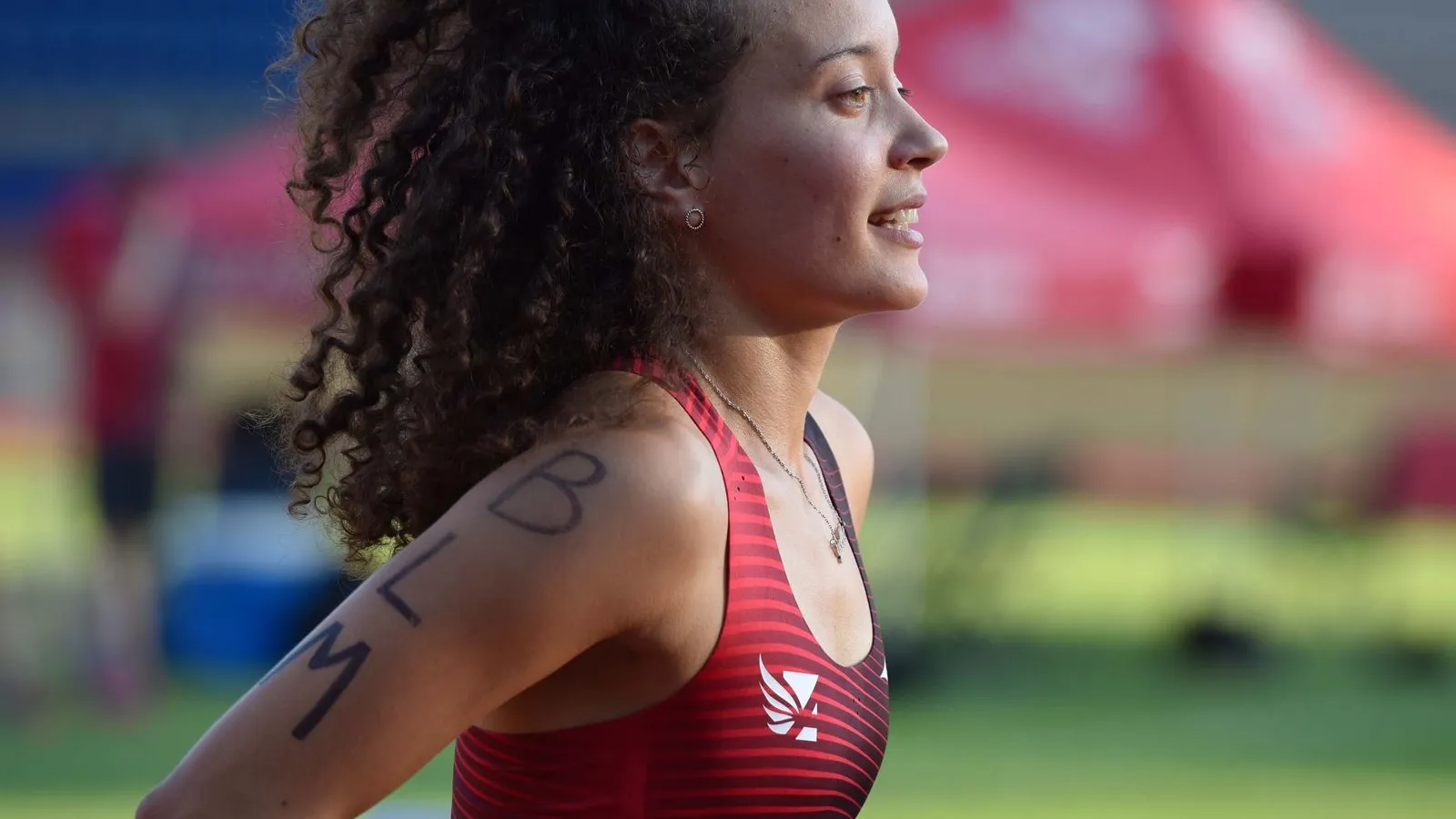 a woman running on a track