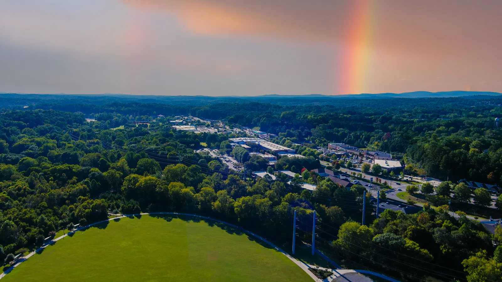 a rainbow over a city