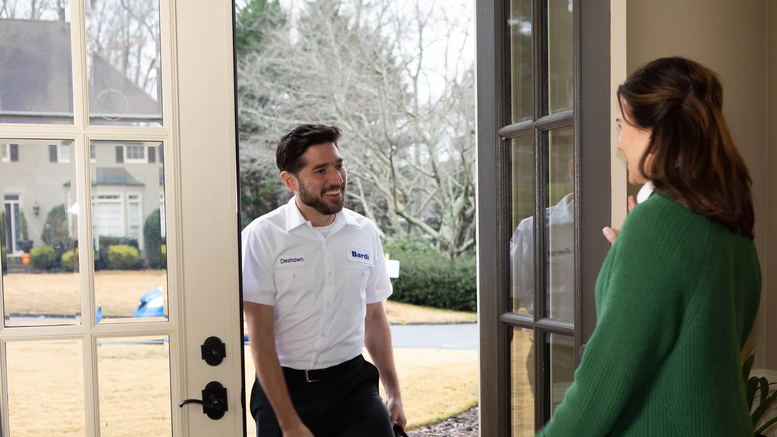 a man and a woman standing in a doorway