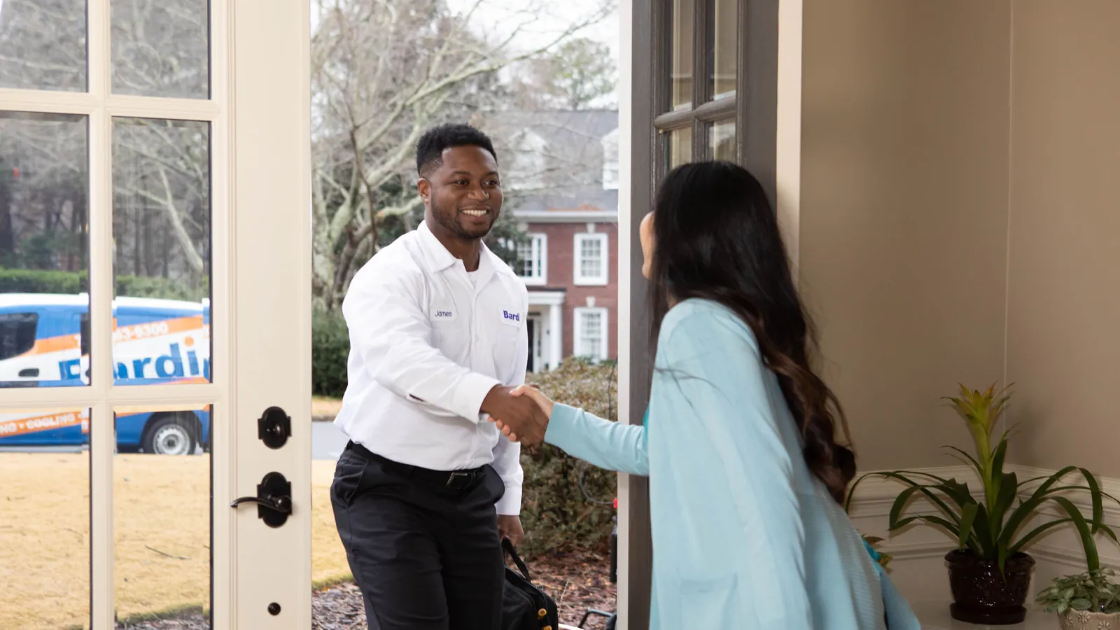 a man and woman shaking hands