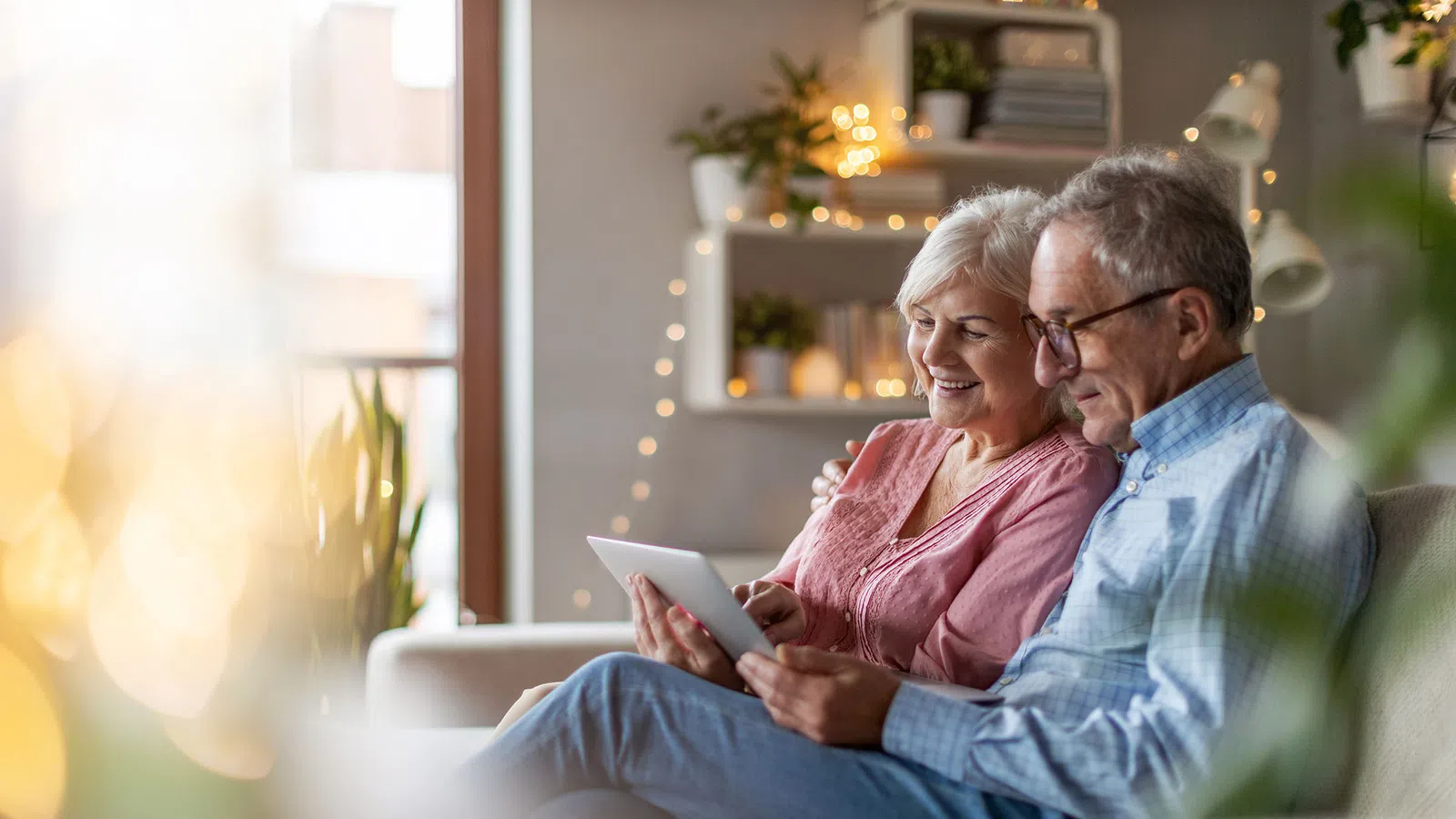 a man and a woman sitting on a couch
