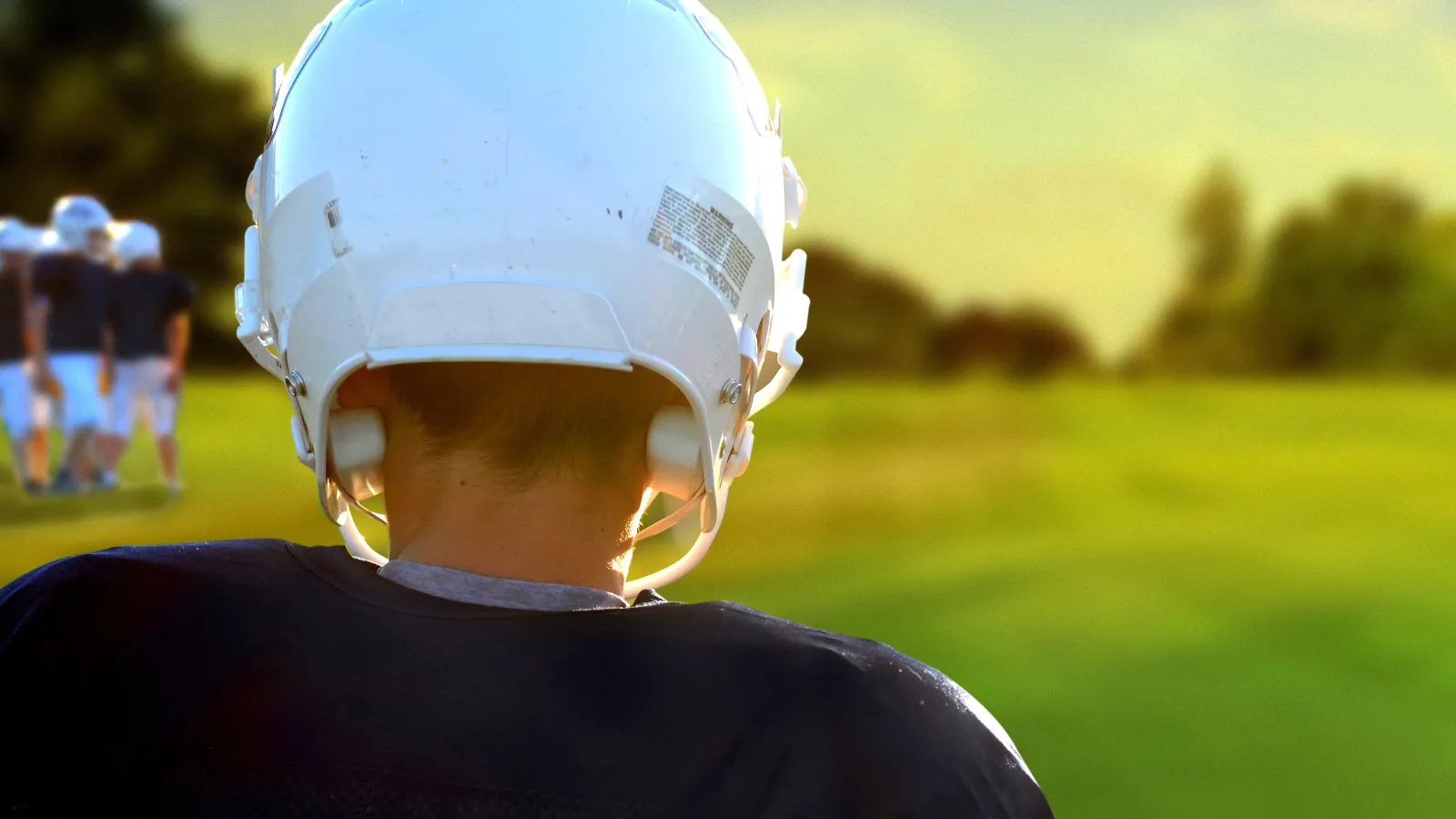 a close up of a person wearing a helmet