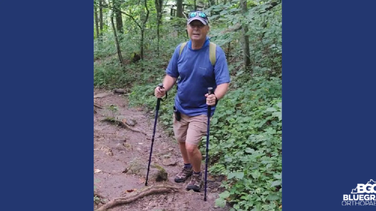 a man with a hiking stick
