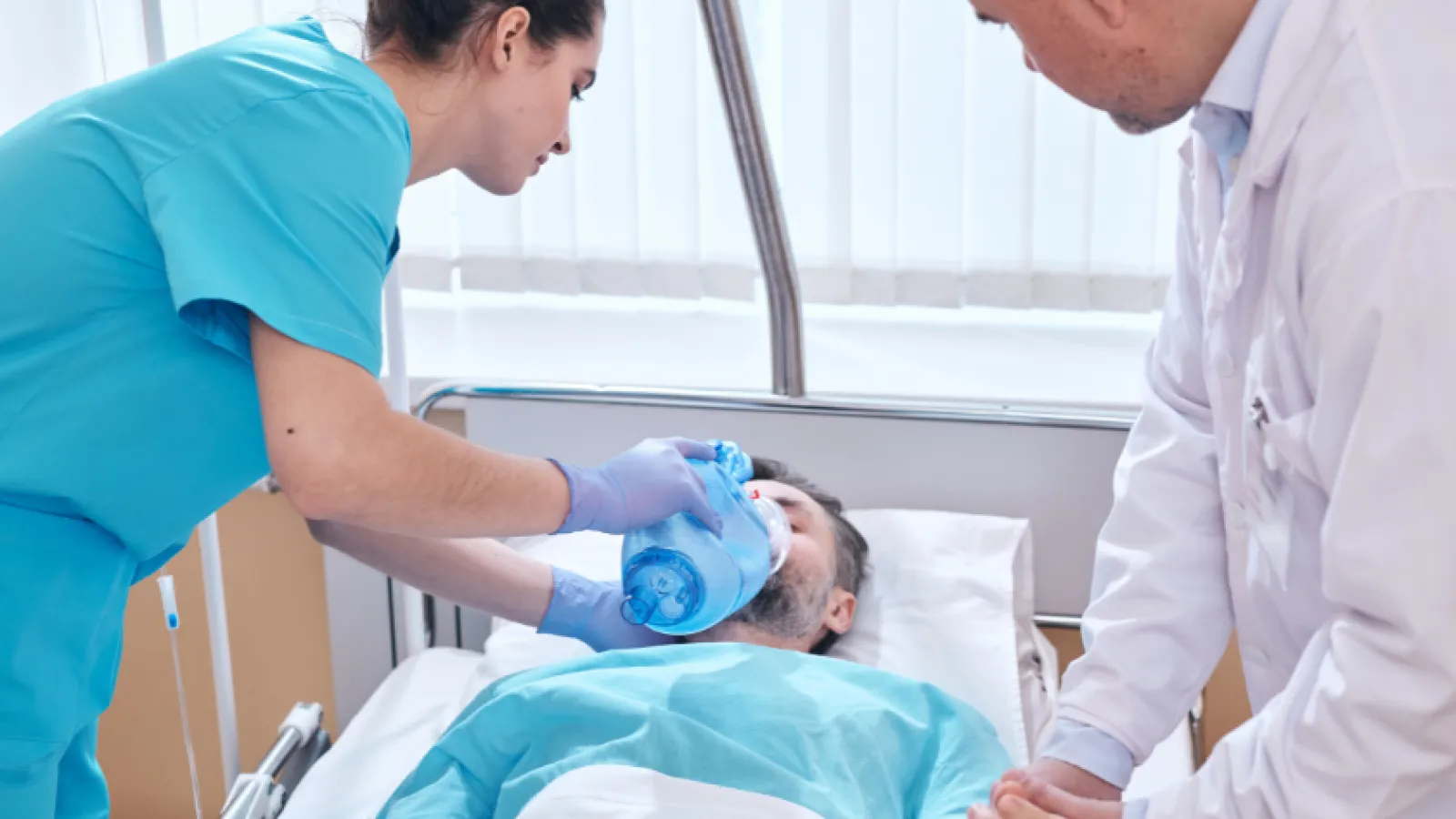 a doctor holding a patient's hand