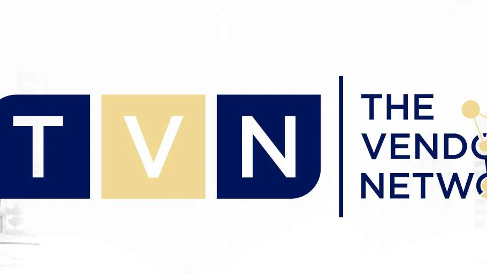 City street with modern apartments and houses with overlaid text reading TVN The Vendor Network logo