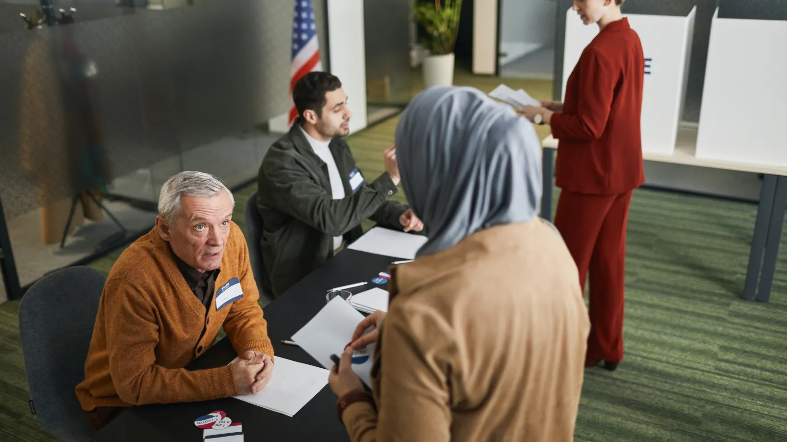 a group of people standing in a room