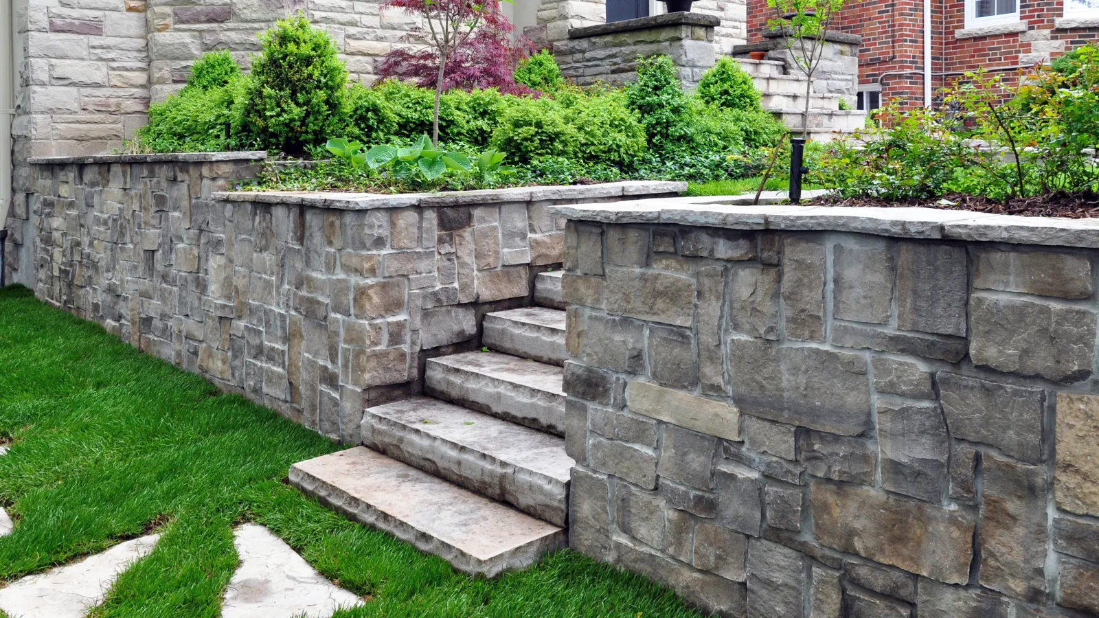 a stone wall with a stone staircase