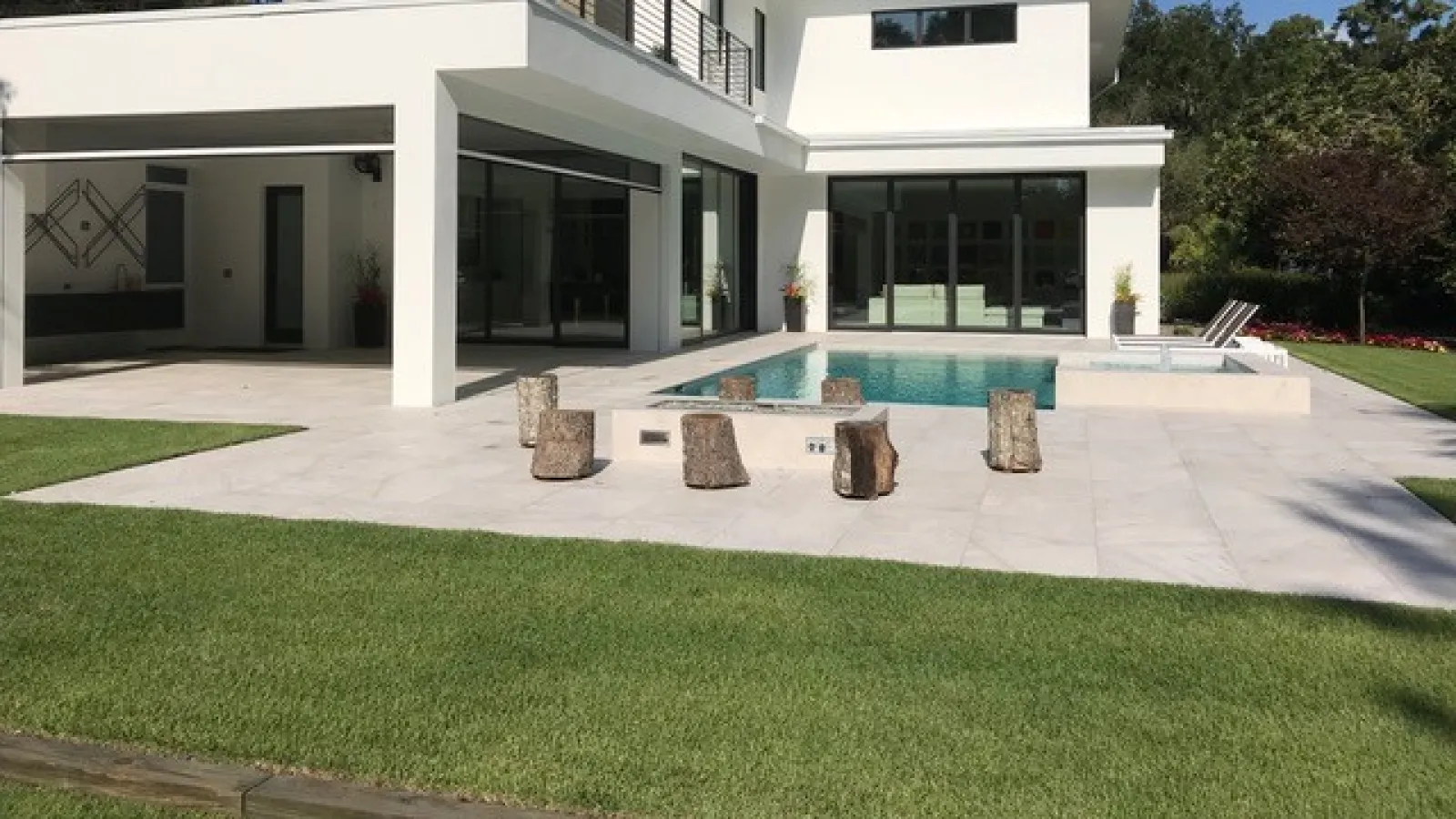 a white house with a pool