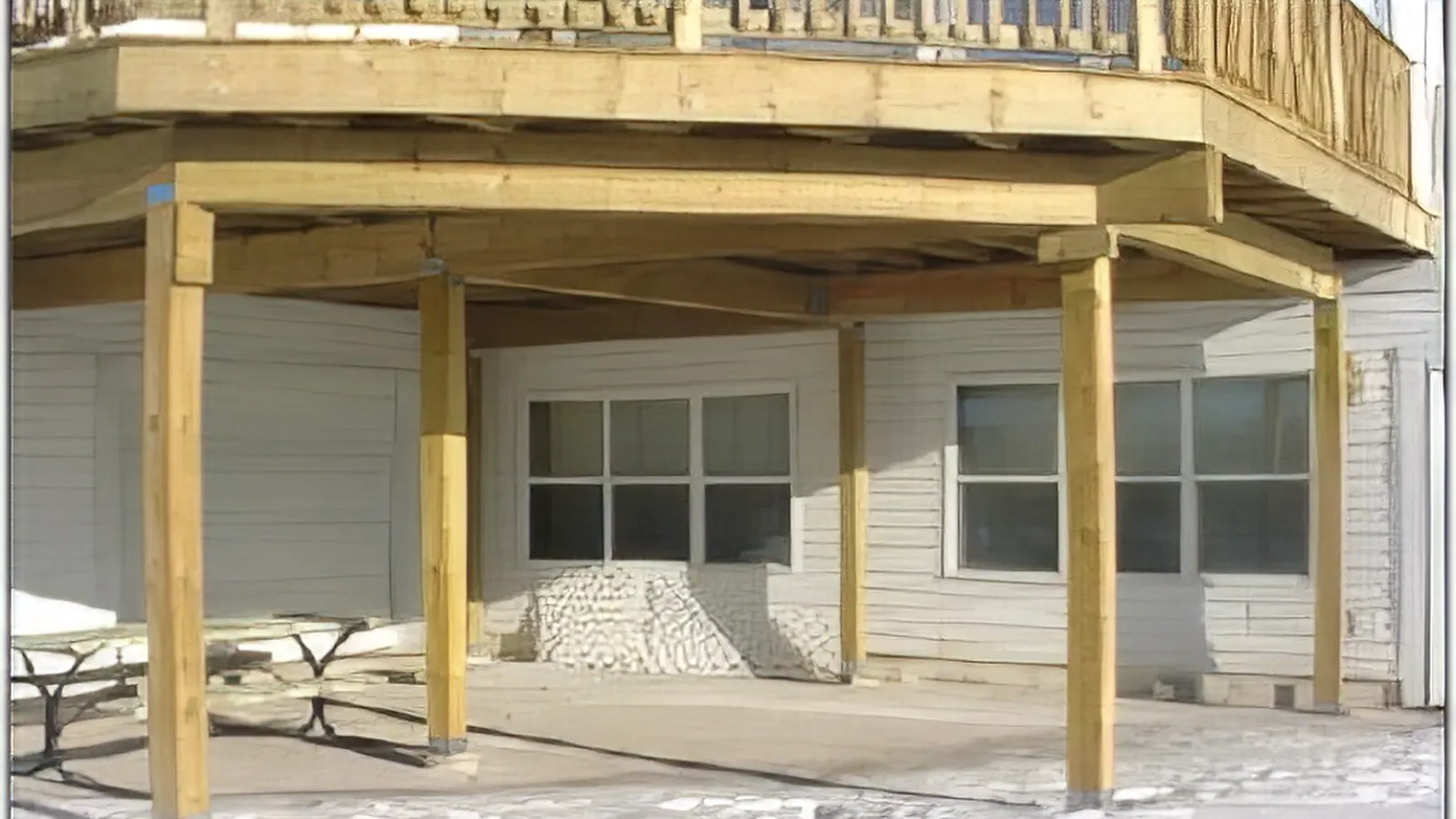 deck with porch supported by helical piles