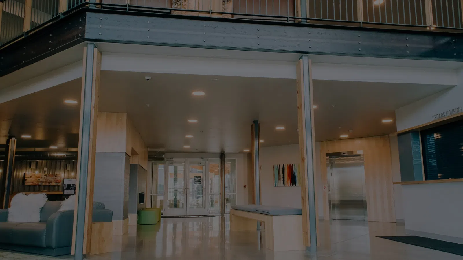 a room with a glass ceiling and white walls