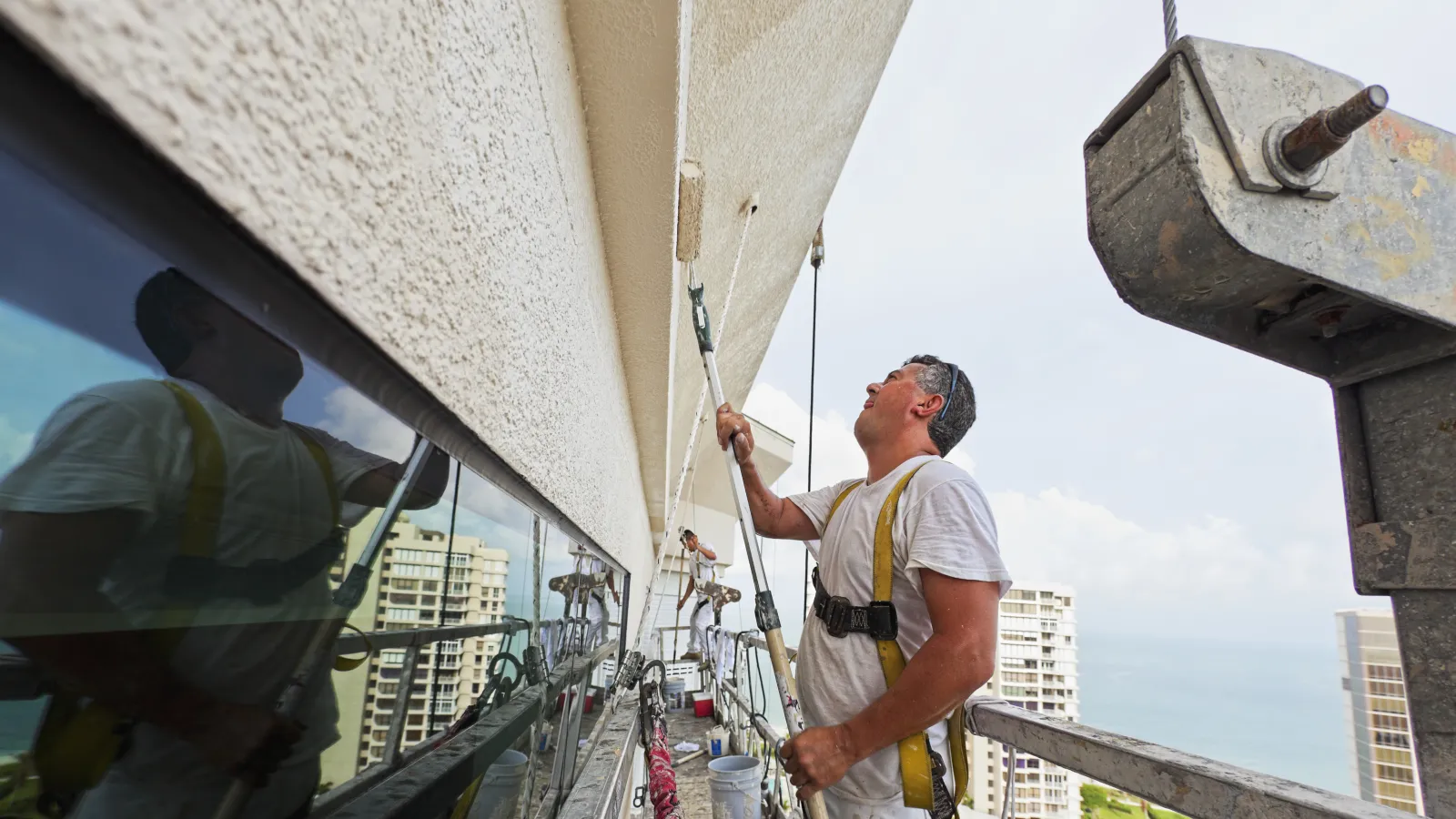 a man fixing a roof