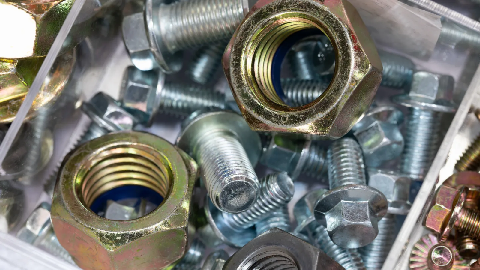 a close-up of a pile of metal parts