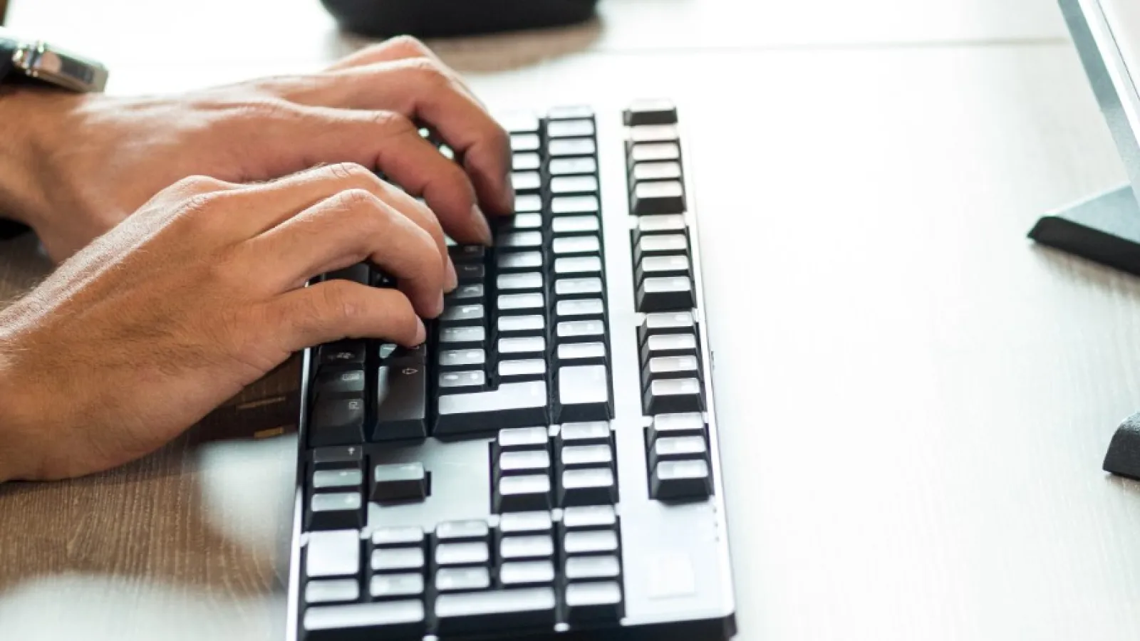a group of people working on computers