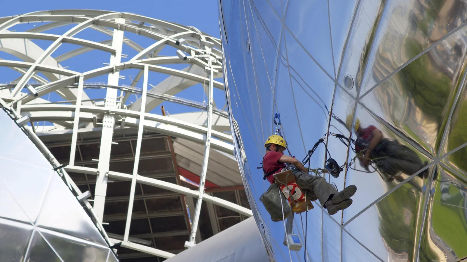 a group of people climbing a tall tower