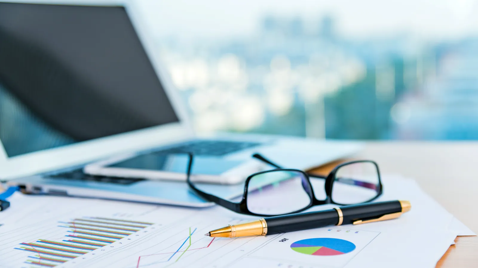 a pair of glasses on a piece of paper