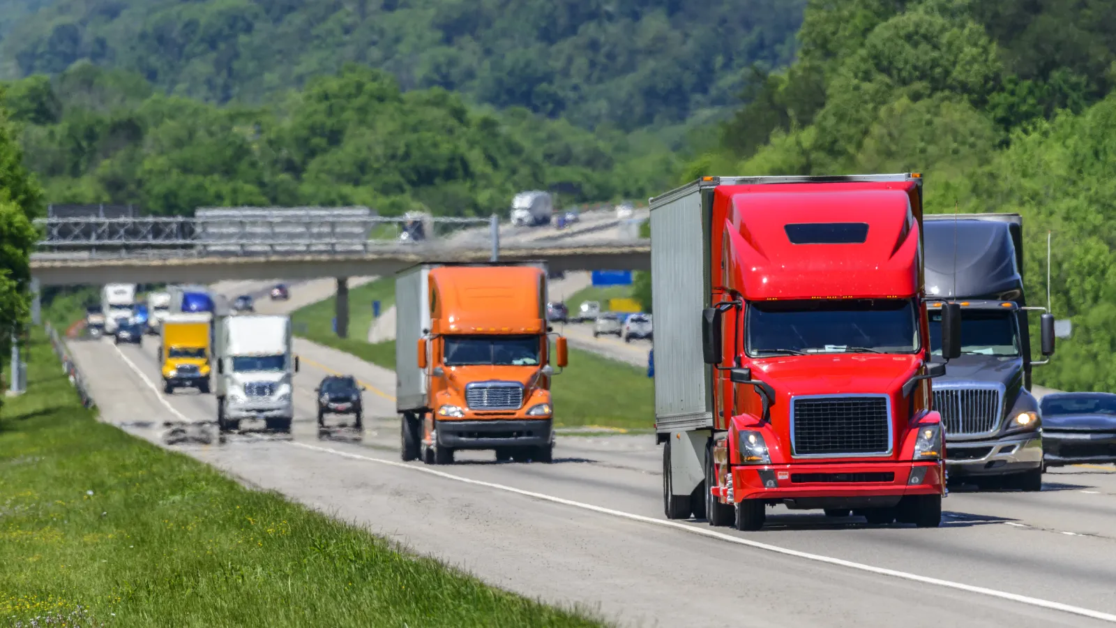 several trucks on a highway