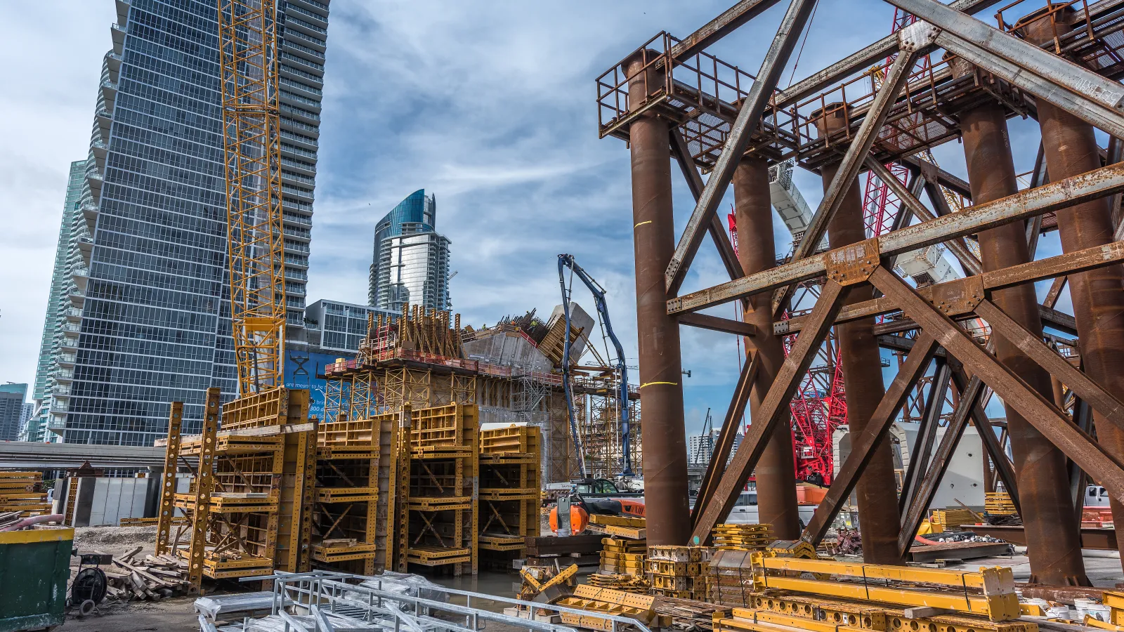 a construction site with cranes