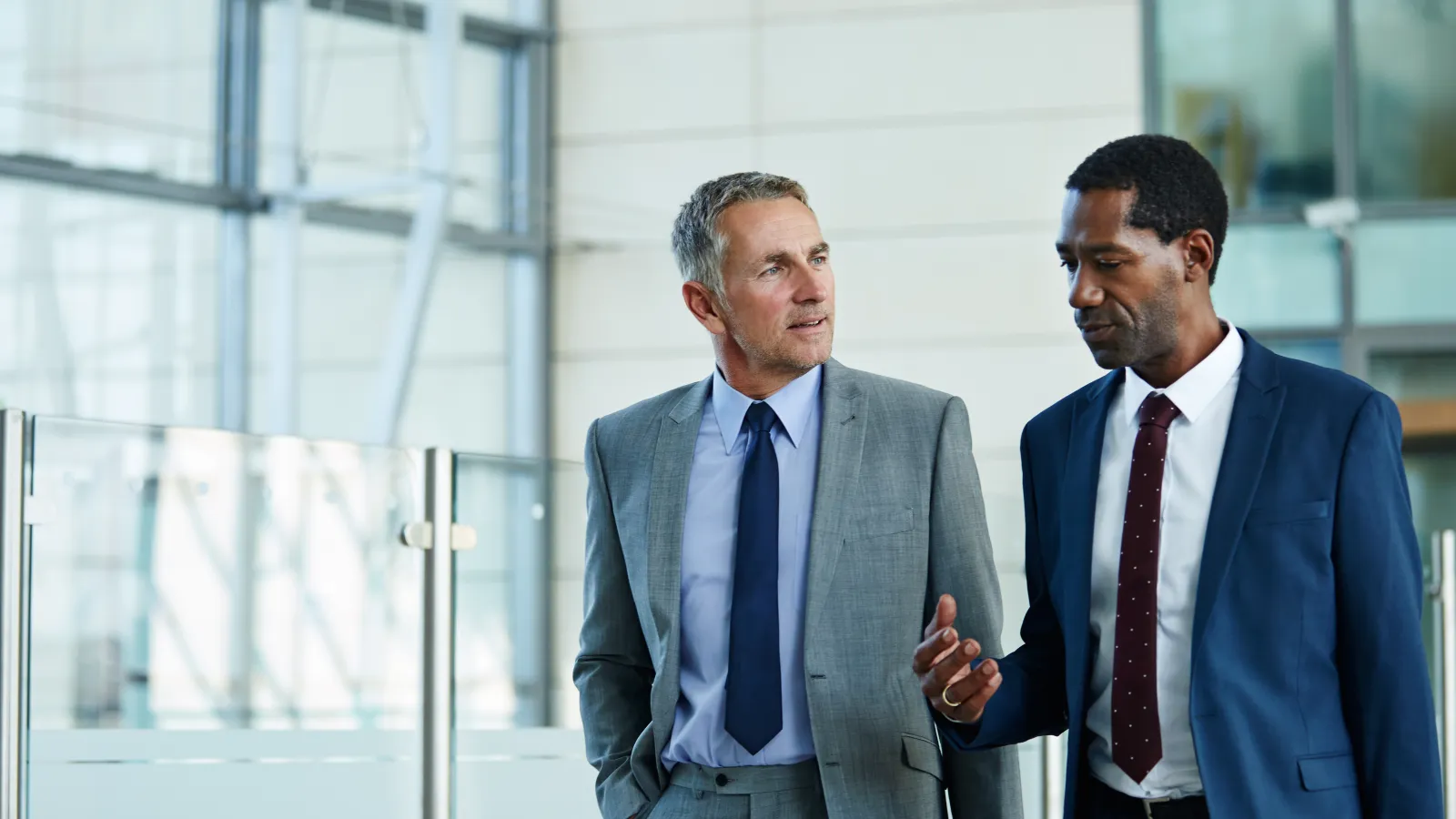 men in suits talking