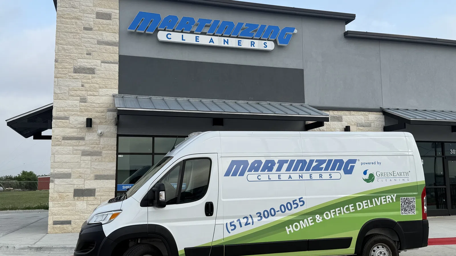 White Martinizing Cleaners delivery van parked in front of store with signage for home and office delivery service.