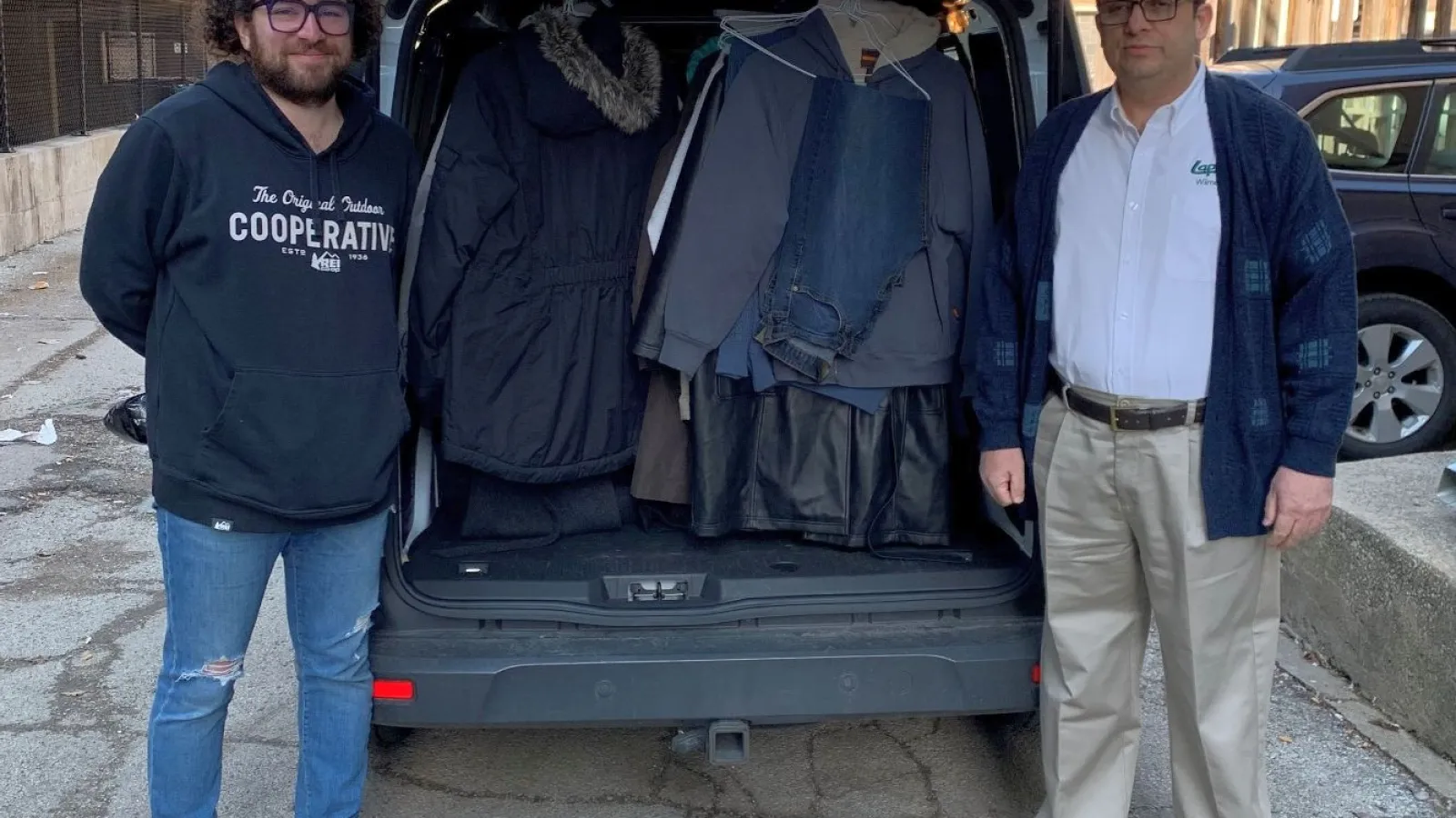 A warm clothing connection. Lapels Dry Cleaning of Wilmette wraps up winter gear drive with Connections for the Homeless