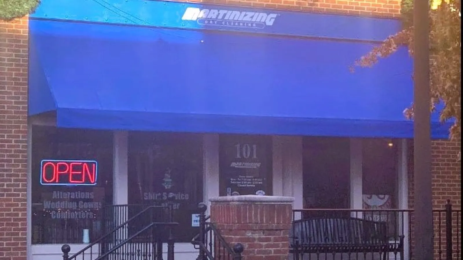 a building with a blue awning