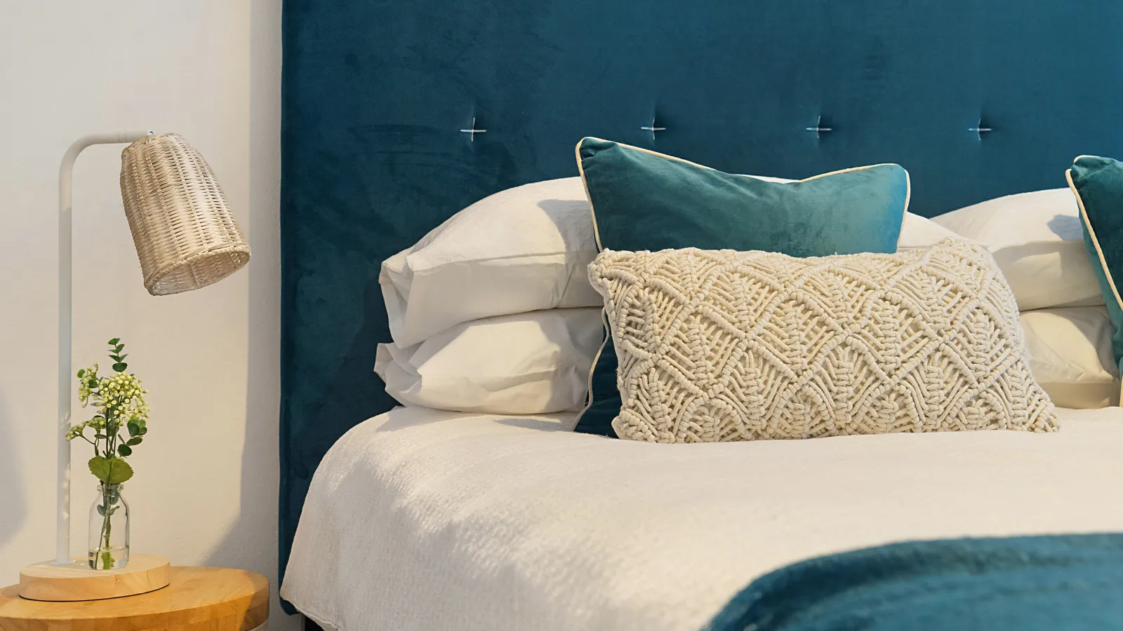 a bed with a blue blanket
