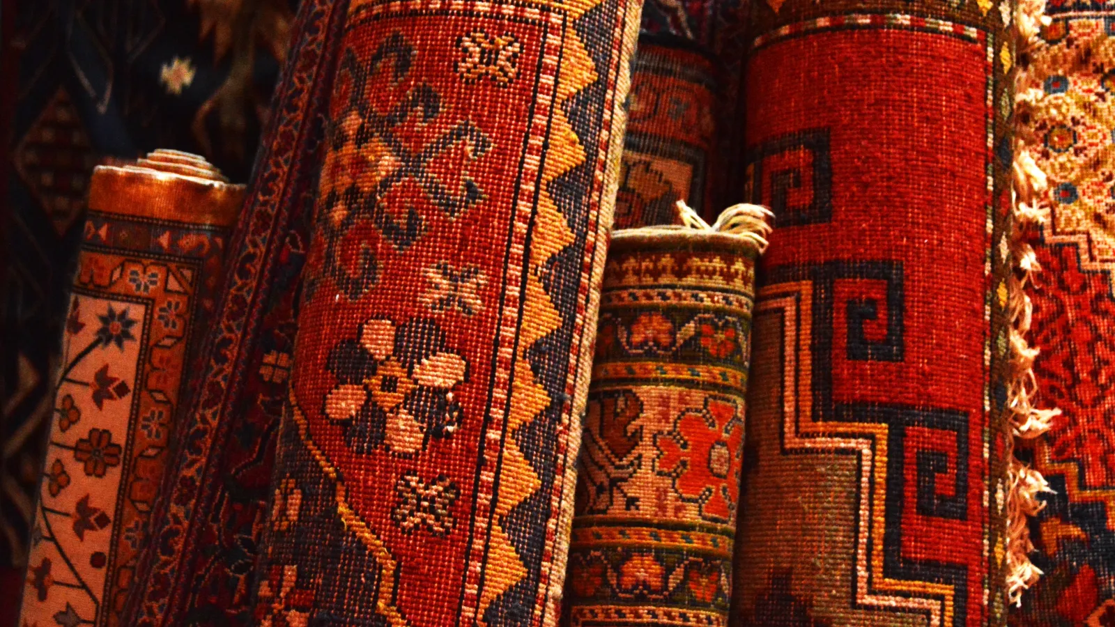a close-up of a red and gold dress