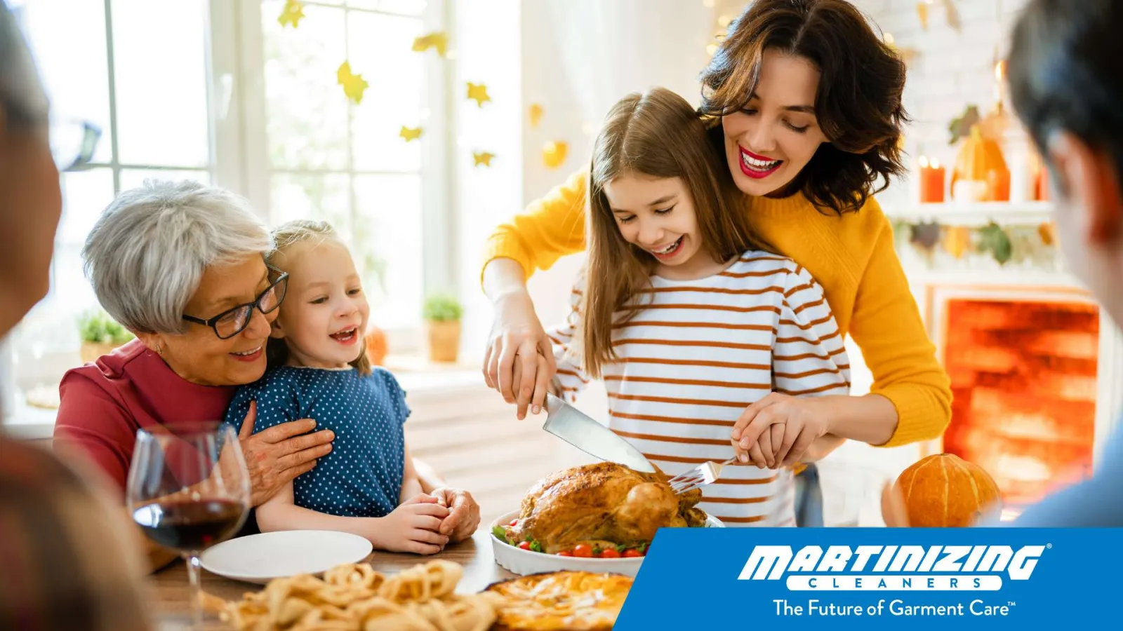 Multigenerational family joyfully carving a roasted turkey together at a festive dining table.