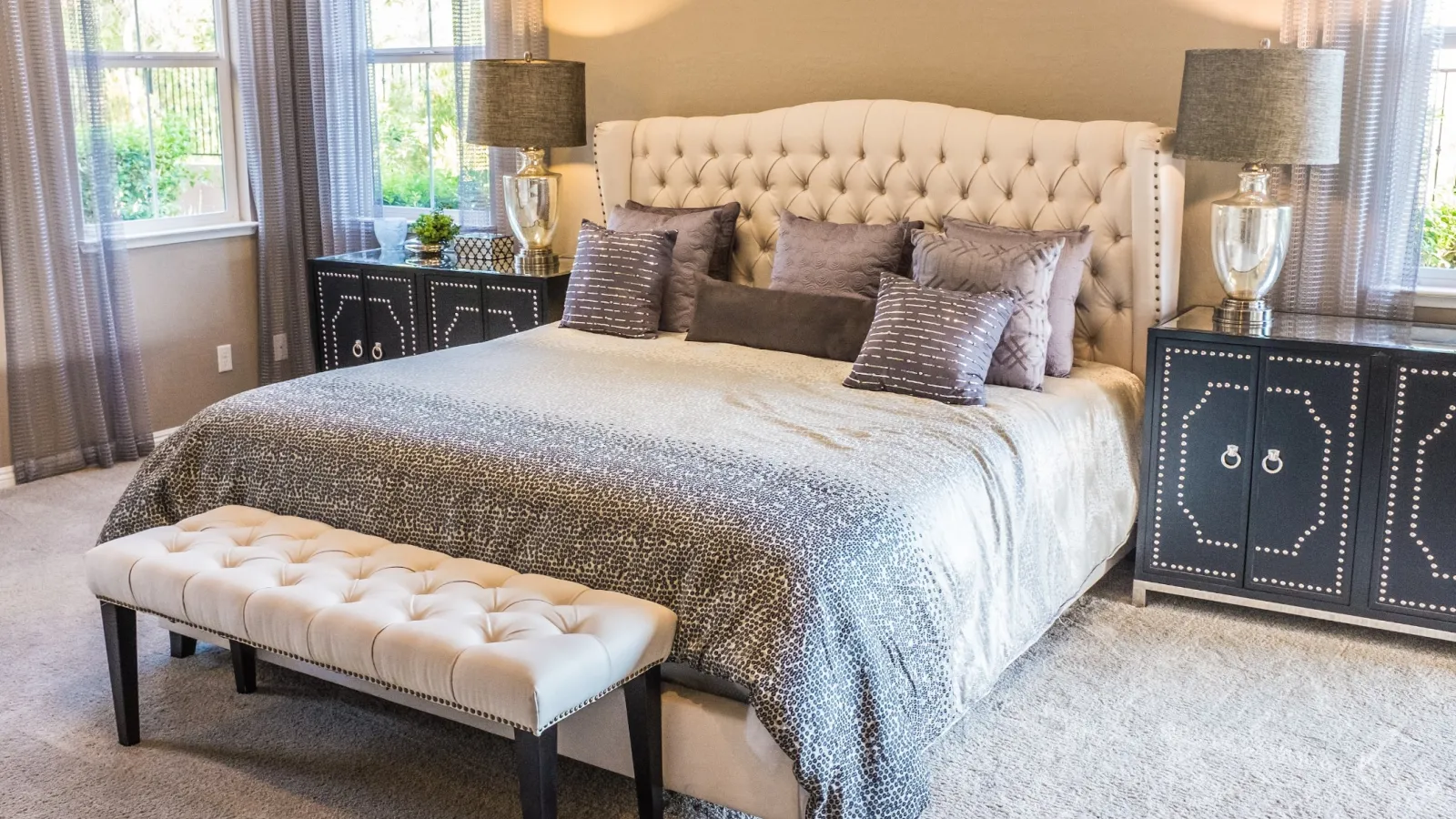 a bed with a white bed spread