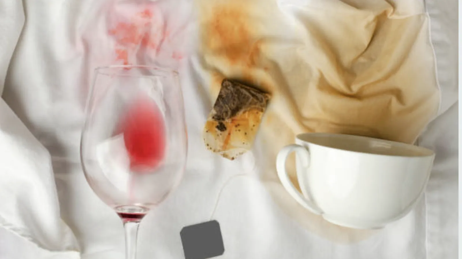 a glass of wine next to a plate of food