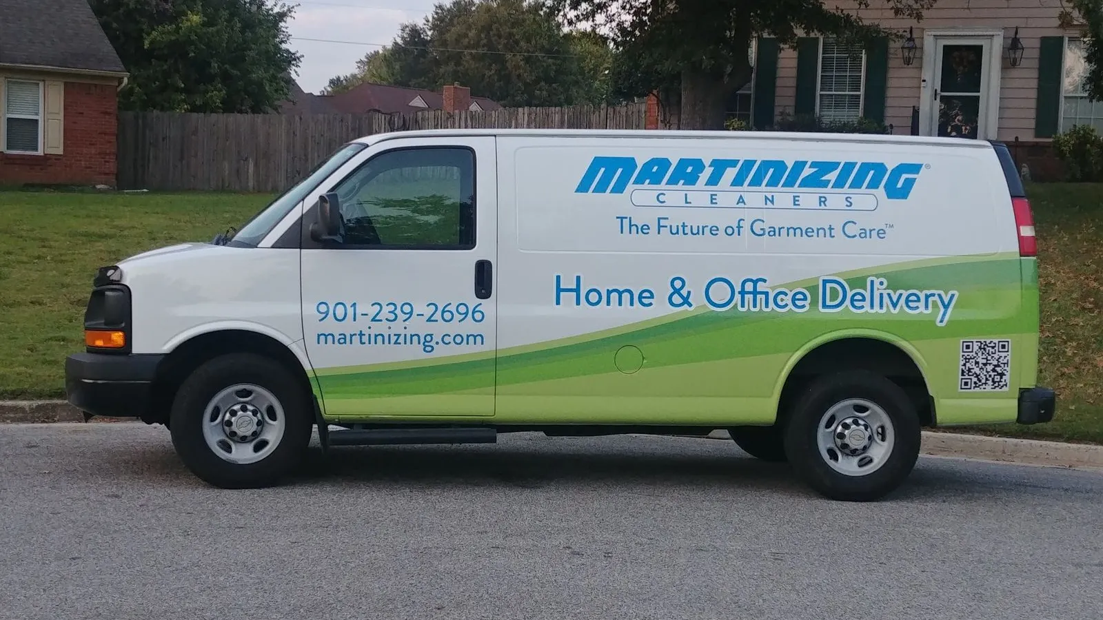 a white van with blue text