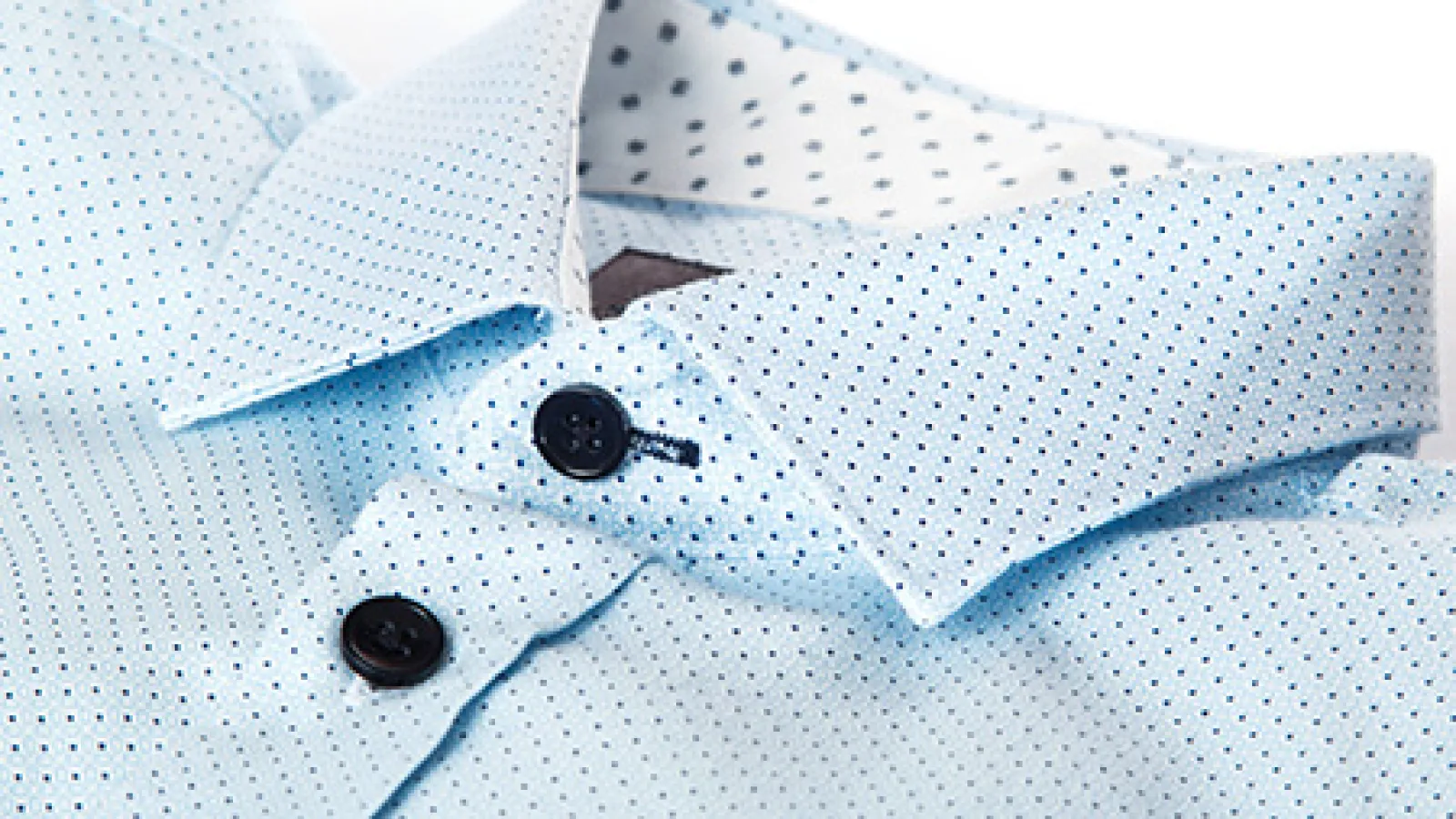 a close-up of a blue dress shirt