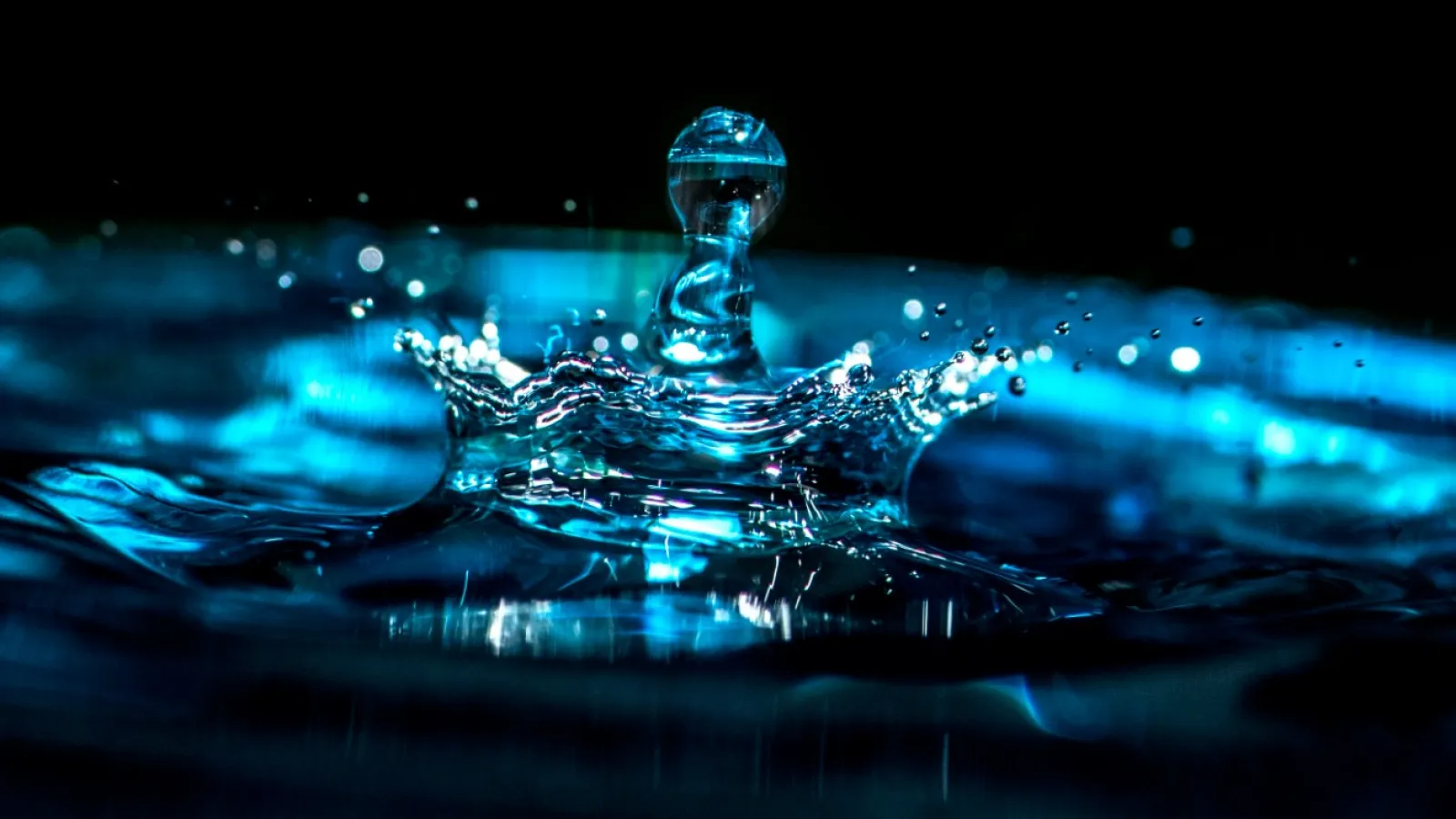 a drop of water falling into water