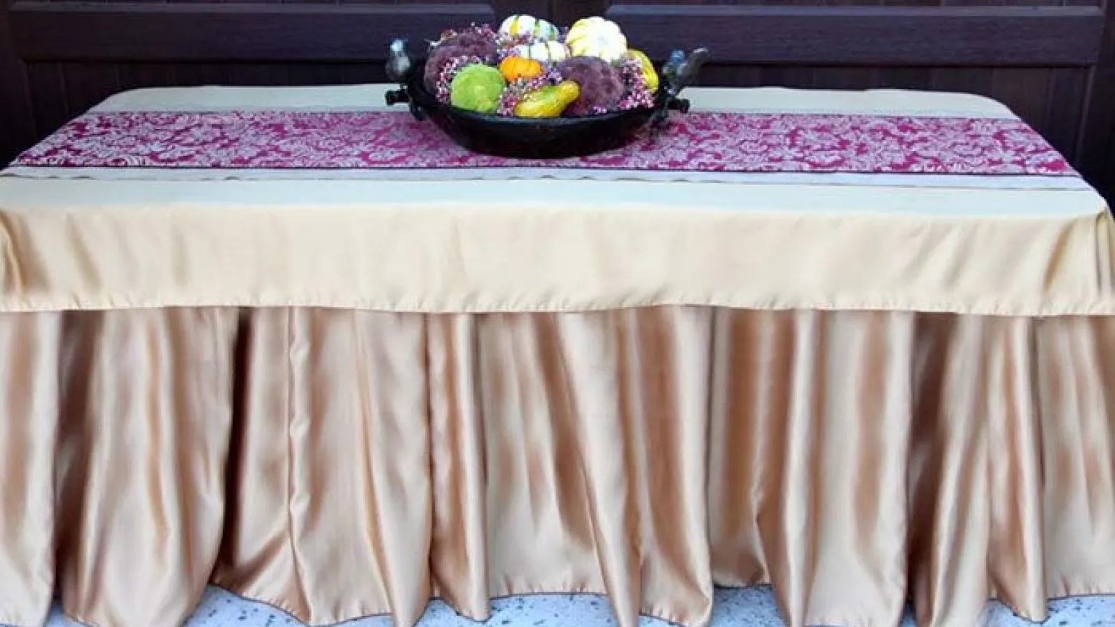 a bowl of fruit on a table