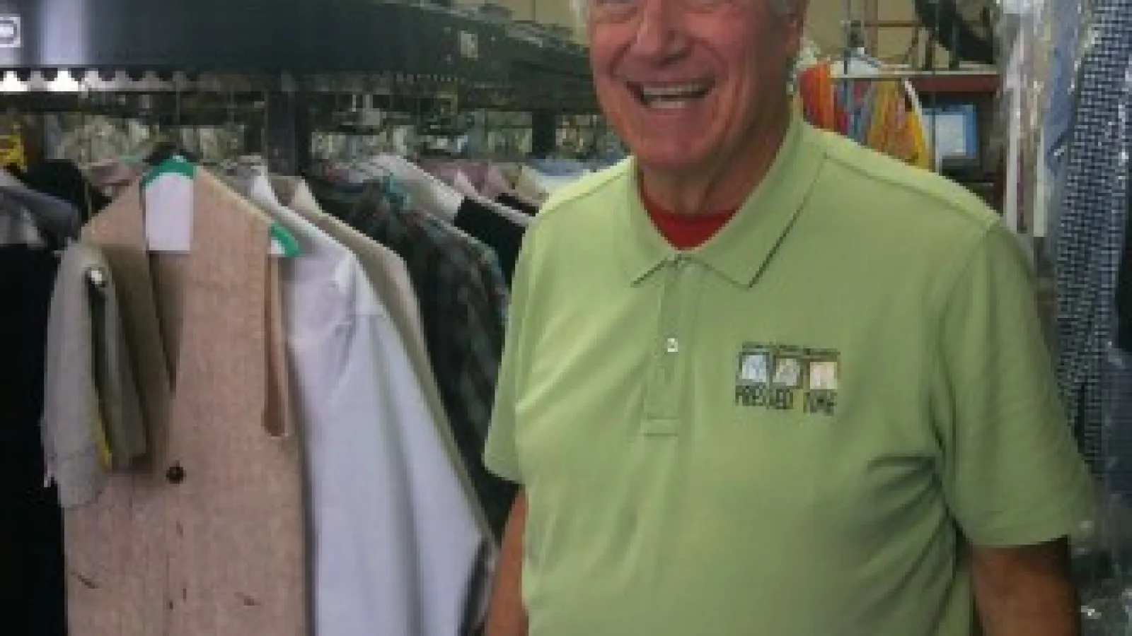 a man standing in a clothing store