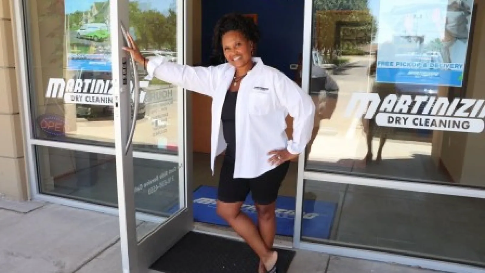 a woman standing at an entry
